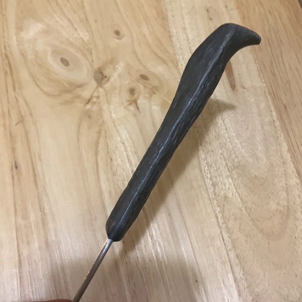 Stainless Steel vintage Ladle with cool sculpted handle